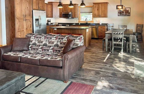 Minocqua House | Dog-friendly lakefront hideaway with docks, firepit, fireplace & W/D