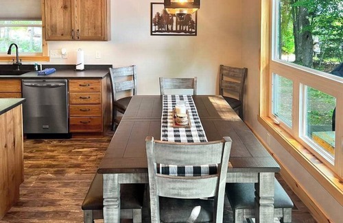 Minocqua House | Dog-friendly lakefront hideaway with docks, firepit, fireplace & W/D