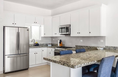 La Paloma Villa | Dog-friendly oceanfront villa with pool access, rooftop patio, full kitchen