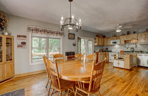 Wiley Cabin | Dog-friendly riverfront cabin w/waterfall view, large decks, firepit, Ping-Pong