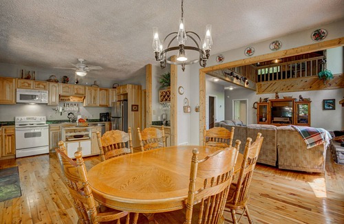 Wiley Cabin | Dog-friendly riverfront cabin w/waterfall view, large decks, firepit, Ping-Pong