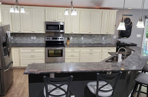 Littleton House | Dog friendly single-story home, Flat lot! Huge game room! 7 ft water depth!