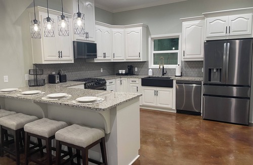 Titus House | Dogwood Cottage Lake Jordan dock/hot tub/fire pit/boat parking/grill/porch swing