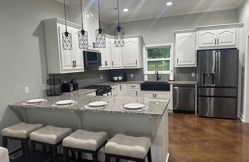 Titus House | Dogwood Cottage Lake Jordan dock/hot tub/fire pit/boat parking/grill/porch swing