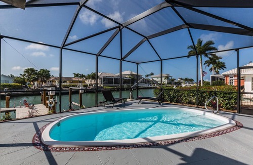 Marco Island House | DOLPHIN BUNGALOW! Remodeled water front getaway in the heart of Old Marco