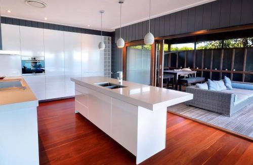 Amity Point House | Dolphins at Sunset