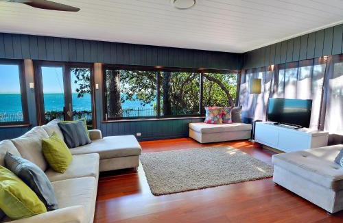 Amity Point House | Dolphins at Sunset