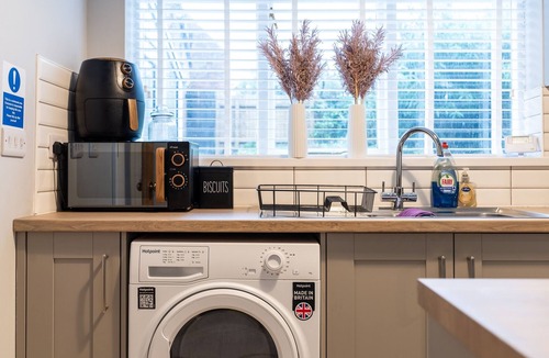 Castle Donington House | Double bedroom 1 with seating and work space