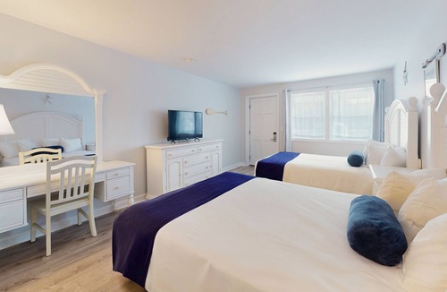 Lower Township Hotel | Double Queen Room for a Cozy Group Stay