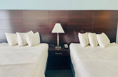 Cuero House | Double Queen With Kitchenette at FairBridge Inn & Suites Cuero, Free Parking!