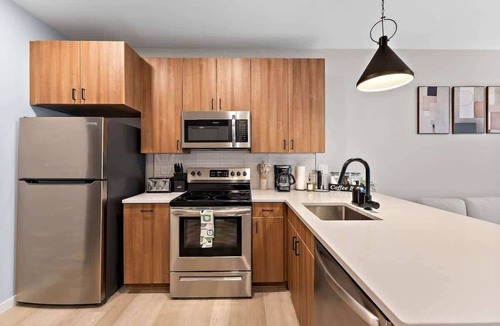 St. Anthony West Apartment | Downtown 2-Bed with Rooftop & Gym
