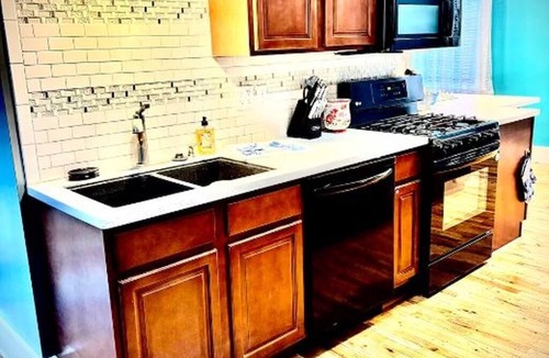 Fort Scott Apartment | Downtown 2BR Sleeps 8 Historic 1911