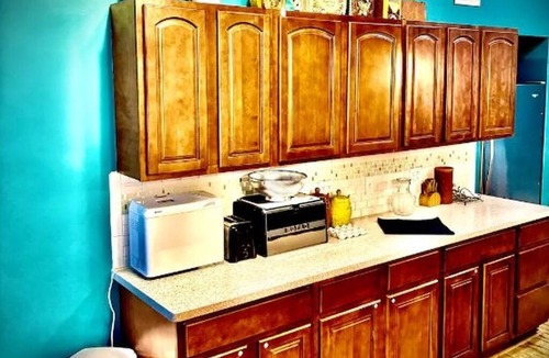 Fort Scott Apartment | Downtown 2BR Sleeps 8 Historic 1911
