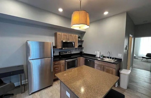 Dubuque Apartment | Downtown Dubuque Retreat, Spa Access, Private Deck, One block to Farmers Market,