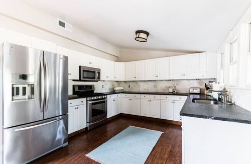 Peak's Suburban Addition House | Downtown Estate Heated Pool and Spa Sleeps 18