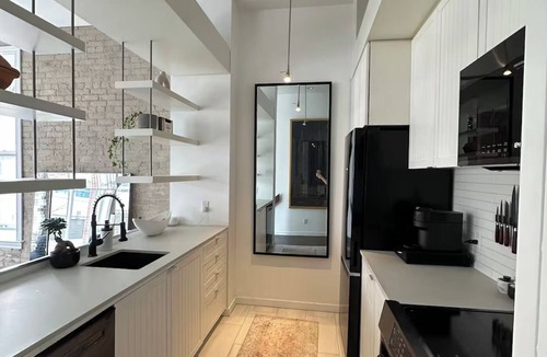 King West Village Condo | Downtown heritage brick loft with 16' ceilings
