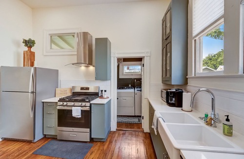 Near East Side House | Downtown home with enclosed backyard, deck, streaming, washer/dryer, central AC