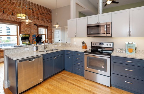 Central Business District Apartment | Downtown Luxury Loft, 13-Ft Ceilings, Walkable