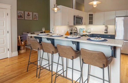Central Business District Apartment | Downtown Luxury Loft, 13-Ft Ceilings, Walkable