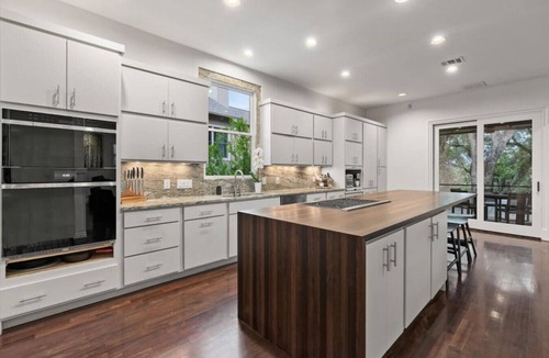 Bouldin House | Downtown Oasis : Heated Pool : Spa : Game room Sunday Ticket