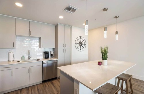 North Trail House | Downtown Oasis: Poolside Condo, Patio & Gym