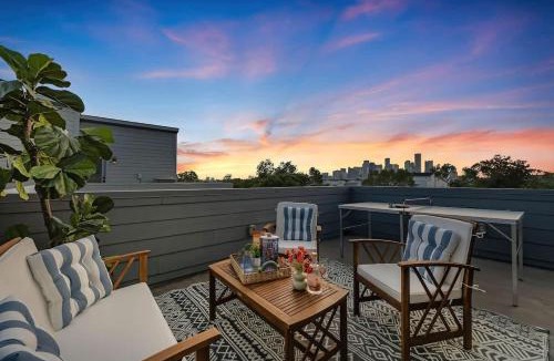 Greater East End House | Downtown Oasis Rooftop with Skyline View