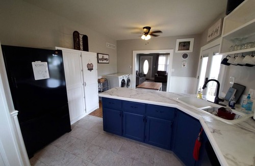 Warrensburg House | Downtown Retreat with large privacy fenced yard. Pet Friendly!