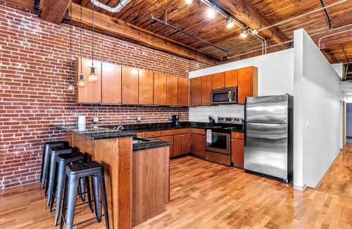 Downtown West Apartment | Downtown STL Loft + 100″ Projector + Private Balcony