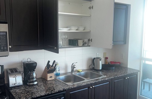 Fort York Apartment | Downtown Toronto suite with CN Tower & Lake views