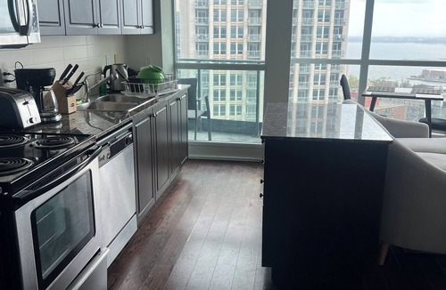 Fort York Apartment | Downtown Toronto suite with CN Tower & Lake views
