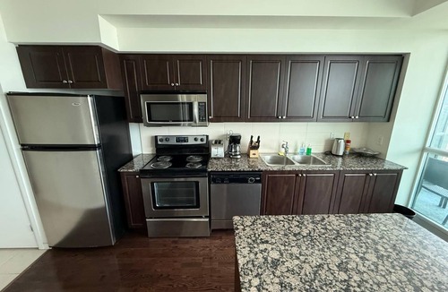 Fort York Apartment | Downtown Toronto suite with CN Tower & Lake views