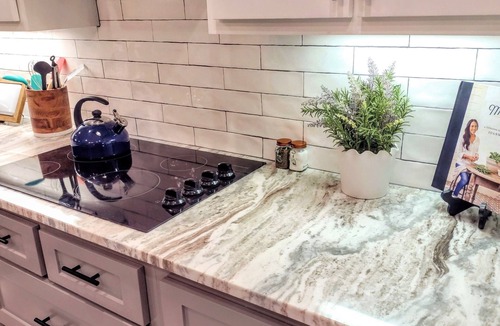 Brazos Condo | Downtown Waco retreat! 2 blocks to Magnolia Silos! Huge private balcony!