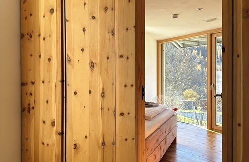 Engadin Scoul House | Dream holiday home "Buna Saira" with mountain views by the stream
