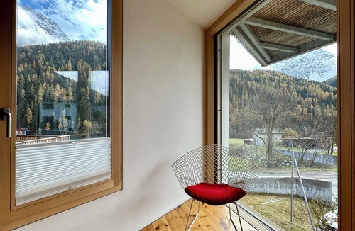Engadin Scoul House | Dream holiday home "Buna Saira" with mountain views by the stream