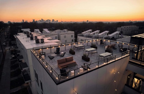 Talbot's Corner Condo | Dreamy Condo with Fireplace, Rooftop, Gym, Parking, Sleeps 5 w/King Bed, Sleeper Sofa, Hidden Bunk, Shared Rooftop and Gym, Free Dedicated Parking, Minutes to Broadway, Five Points & Grand Ole Opry, 24 Hr Hospitality