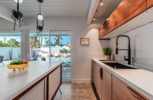 Racquet Club Estates House | Dreamy Mid Century Modern House with Saltwater Pool & Resort Style Backyard