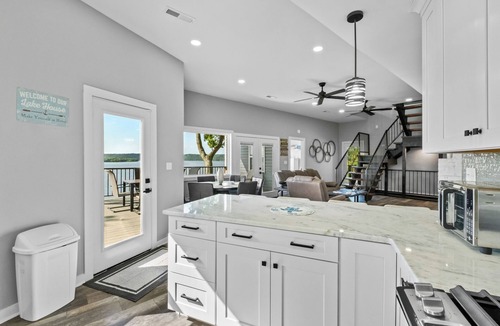 Fairland House | Driftwood Lodge: Boat Dock, Game Room, & Lake Views