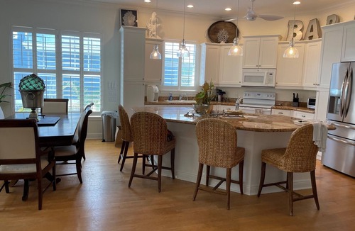 Anna Maria Villa | Duplex Heated Pool Walk to Beach