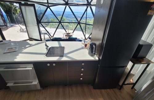 Waiatarua Cabin | DuskDawn Glass dome glamping in the bush near AucklandnNOW with a Spa!