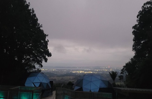 Waiatarua Cabin | DuskDawn Glass dome glamping in the bush near AucklandnNOW with a Spa!