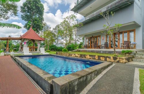 Sawan House | DWM Mandhasativa Homestay By Reccoma