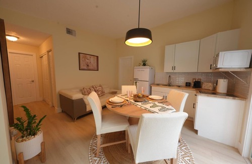 Tamiami House | E&A SouthWest - Sandy Beach Suite with Private Terrace