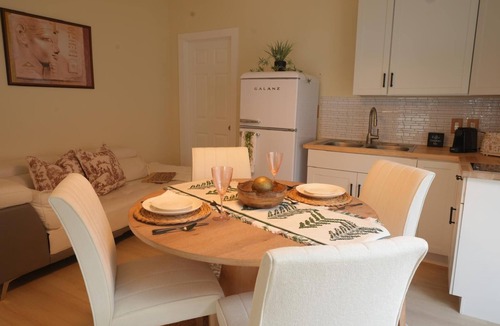 Tamiami House | E&A SouthWest - Sandy Beach Suite with Private Terrace