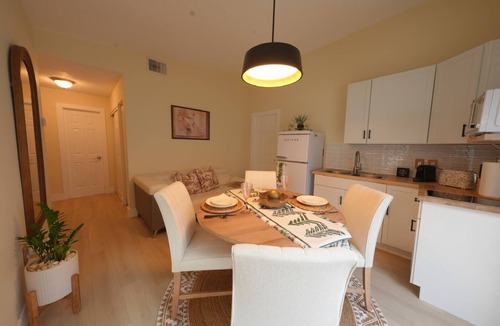 Tamiami House | E&A SouthWest - Sandy Beach Suite with Private Terrace
