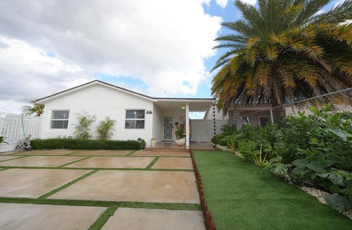 Tamiami House | E&A SouthWest - Sandy Beach Suite with Private Terrace