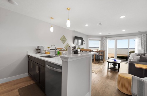Traverse City Condo | East Bay Bliss - Beachfront Condo on East Grand Traverse Bay