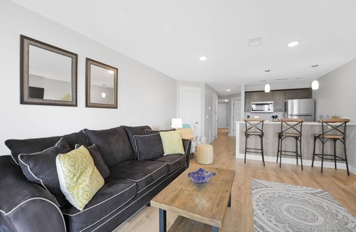 Traverse City Condo | East Bay Bliss - Beachfront Condo on East Grand Traverse Bay