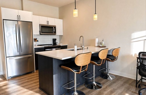 Lower East Side Apartment | East Side Luxury 1BR Apt · Near Brady St with Balcony and Lounge · Sleeps 4