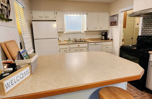 Emporia House | Easy Access to area events-Mid-Century Home