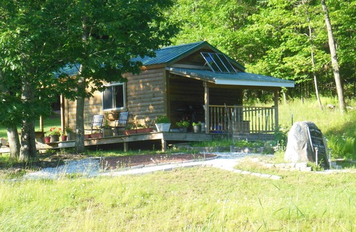 Wellsville Cabin | Ebb~n~Flow-Rustic-Solar Cabin-Heated-Hiking-Biking-Pond-Wildlife-Dark Skies-Pets
